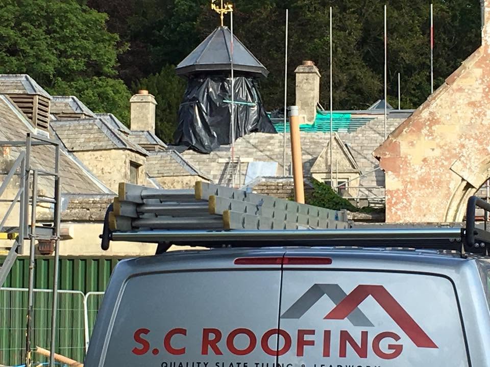 SC Roofing van at estate property